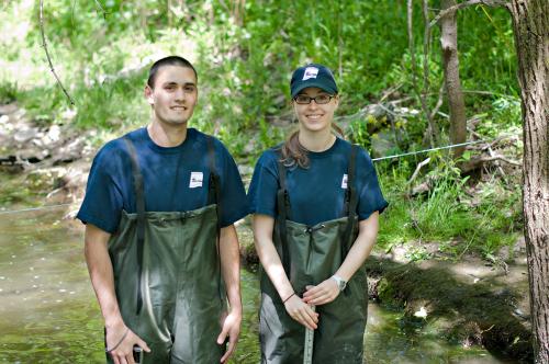 A male and female Environmental Sciences students in their work environment